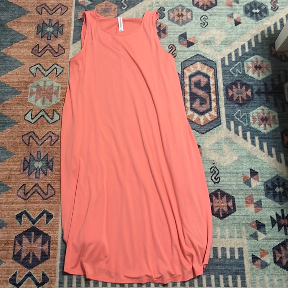 Tank top dress with pockets.